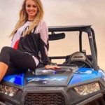 Woman Sitting on Dune buggy