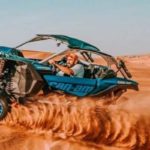 Man Riding Dune Buggy