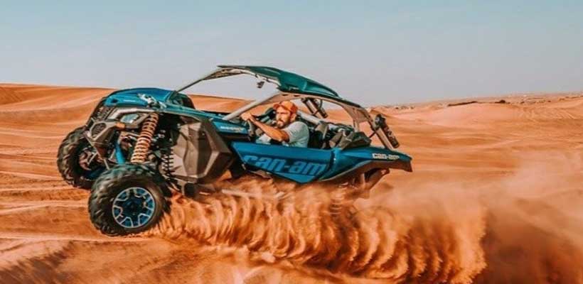 Man Riding Dune Buggy