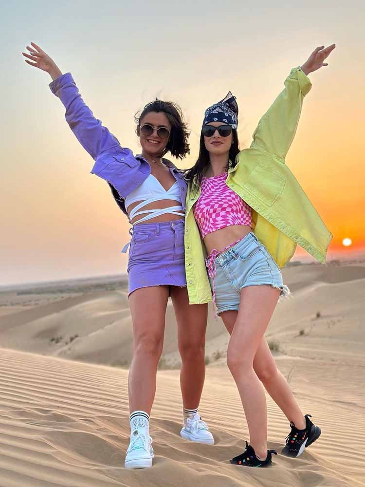 Tourist Girls Enjoying in Dubai Desert