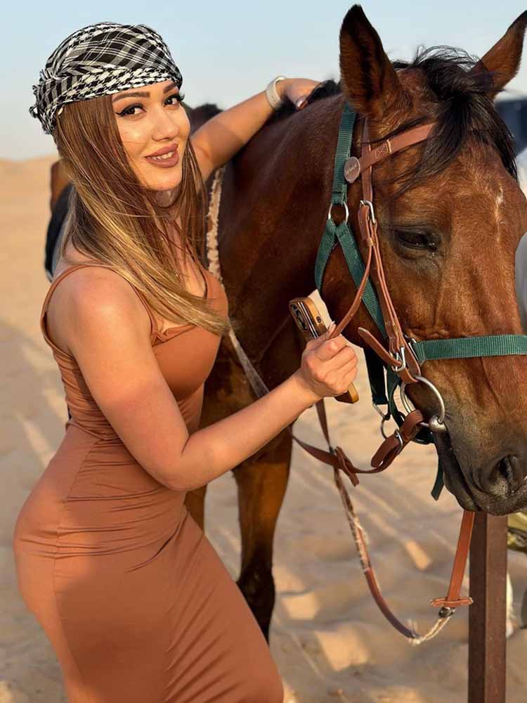 Woman Ready for Horse Riding in Dubai Desert