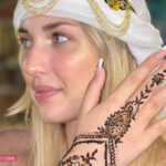 Tourist Woman Showing Henna Painting