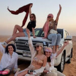 Tourist Group enjoying Dubai Desert Safari Tour