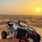 Tourist Girl Standing in front of 2-seater Dune Buggy Dubai Tour