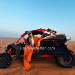 Tourist Girl Standing in front of CANAM Dune Buggy