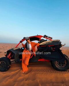 Tourist Girl Standing in front of CANAM Dune Buggy