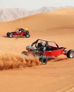 2 Red Dune Buggies during Desert Safari Tour