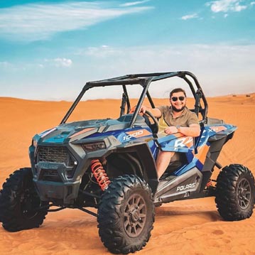 1 Tourist Man sitting in 1-seater Dune Buggy Ride Dubai Desert