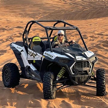 Tourist Girl Riding 2-seater Dune Buggy Ride Dubai