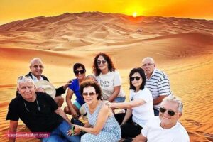 tourist family during sunset photography at dubai desert safari