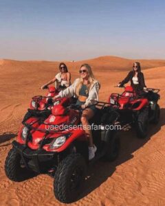 Tourist Female Friends on-Quad-Bike-Ride-Dubai-Tour